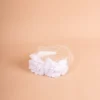 Fascinator mit Blumen und Schleier