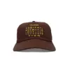 VISIT Cap Malaysia front VISIT Cap Malaysia Ansicht frontal mit gelbem Stick, Cap mit tamilischem Alphabet